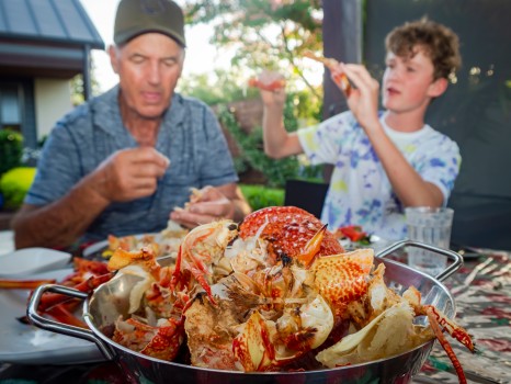 Family Eating Seafood Crayfish