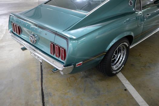 Classic teal Ford Mustand Mach 1 3rd quarter rear view