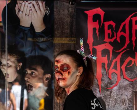 Girl wearing a face of the fear factory