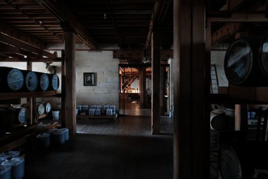 Whiskey barrels in a distillery 