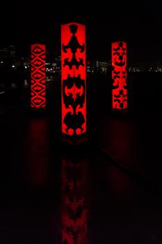 Three red light sculptures