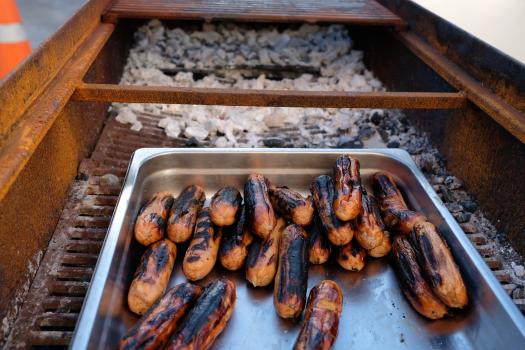 Barbecued sausages on charcoal