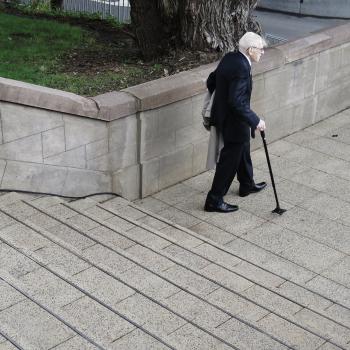 Old war veteran with cane
