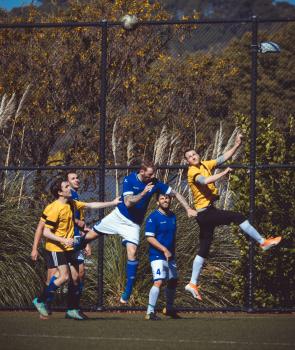 Ball flying high over player's heads - Sports Zone sunday league