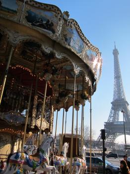 Merry go round carousel and Eiffel tower Paris