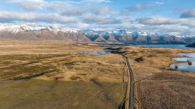 Drone perspective of the road out to Lake Ohau