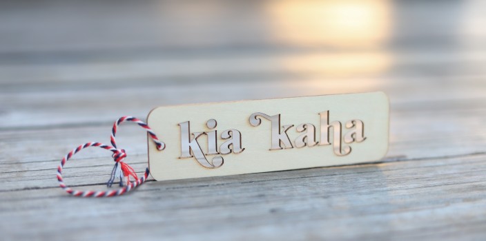 Kia Kaha phrase on a wooden plaque