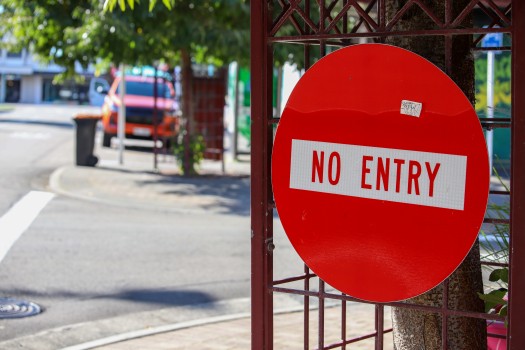 'No Entry' sign on a gate