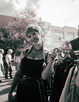 Tattooed woman posing for a photo at Newtown festival 2021 black and white