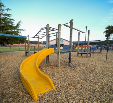 Curved slide at an outdoor play area