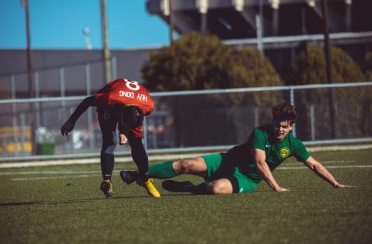 Player losing balance and tripping at Hutt valley - Sports Zone sunday league
