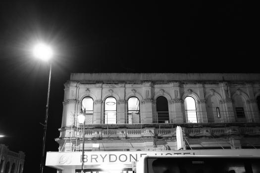 Building facade at night in Christchurch monochrome