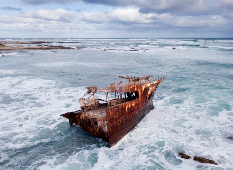 Old shipwreck in a stormy sea