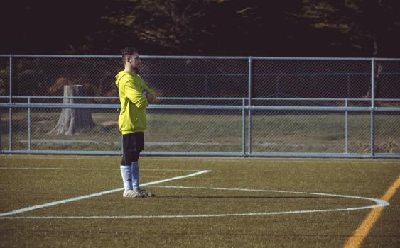 Goalkeeper standing crossed arms - Sports Zone sunday league