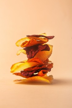 Stacked chips on peach background