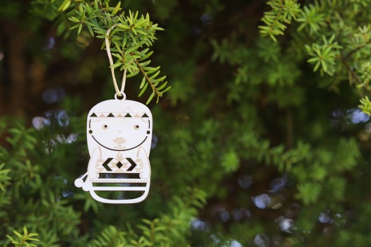 Native woman ornament on a tree background