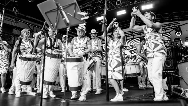 Drum and bell performance at Cuba Dupa 2021 monochrome