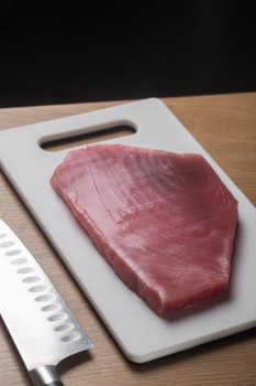 Slab of meat on a cutting board