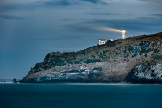 Tairoa Head lighthouse emits shaft of light