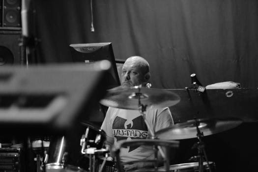 Drummer of band "Vietnam" in wu-tang shirt monochrome
