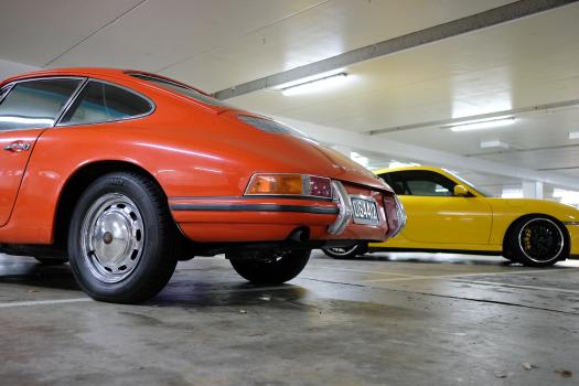 Classic orange and modern yellow Porsche
