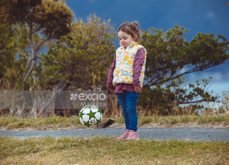 Girl in a floral sleeveless jacket at Little Dribblers