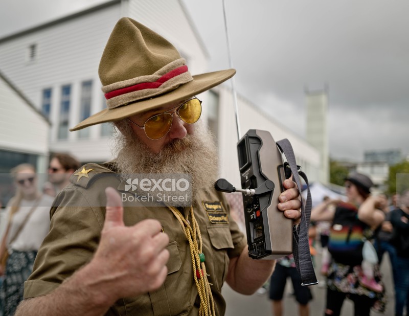 Old park ranger giving a thumbs up at Newtown festival 2021
