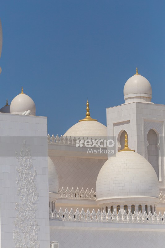 Sheik Zayed Grand Mosque white tiles and golden accents