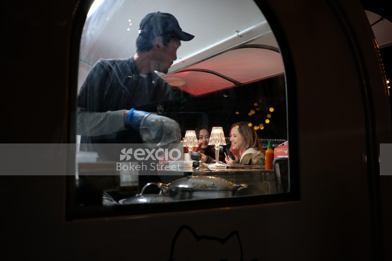 Chef preparing order in the food truck