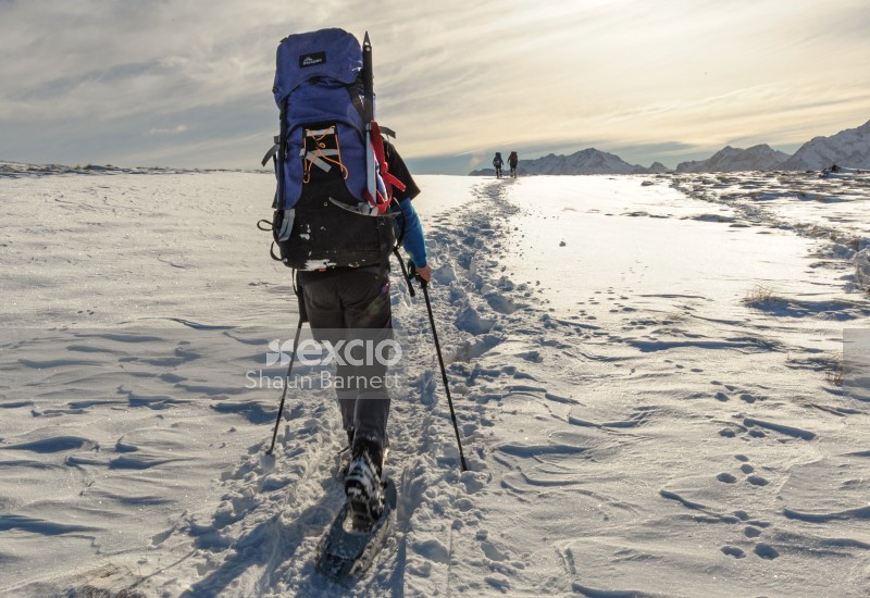 Trampers snow-shoeing Kepler Track