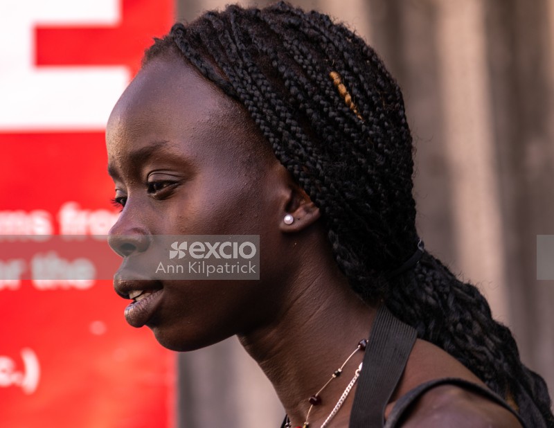 Dark skinned woman with braids