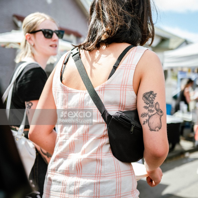 Woman with rabbit tattoo