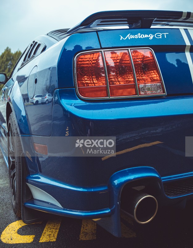 Blue Ford Mustang exhaust pipe