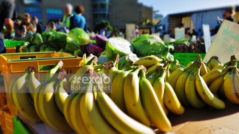 Bananas and cabbages for sale at fruit & vegetable market