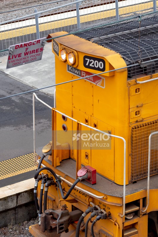 Yellow kiwi electric train