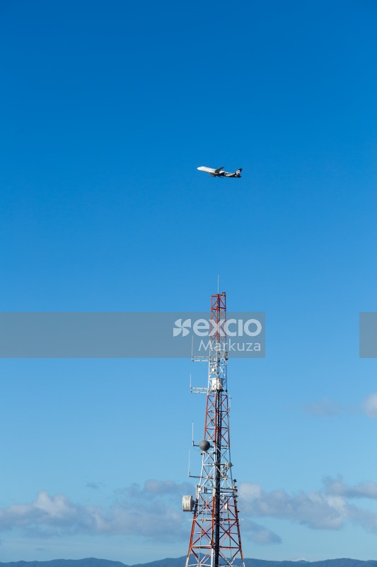 AIR NZ flight over communcations tower