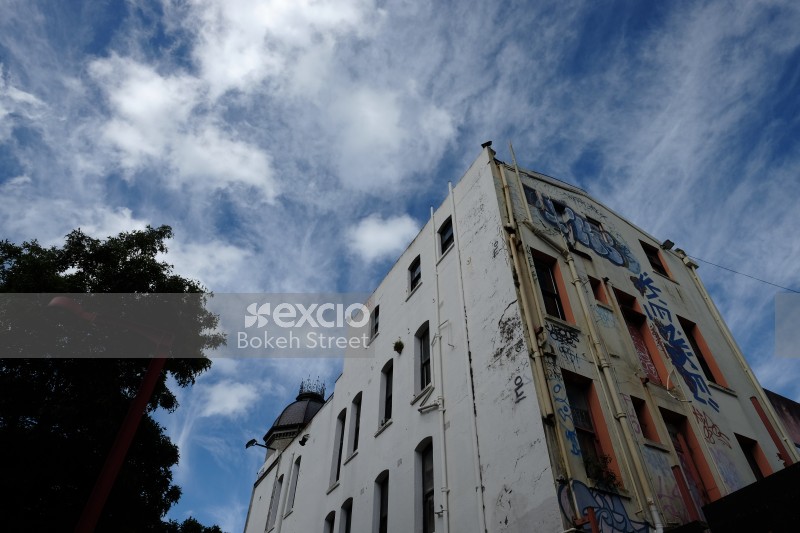 Graffitied facade of a building on Cuba Street