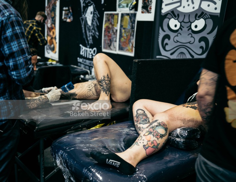People getting tattoos at Wellington tattoo convention 2021