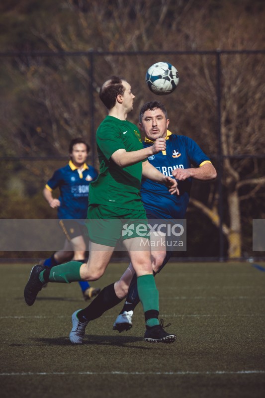 Bald player in green kit - Sports Zone sunday league