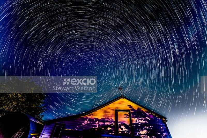 Star trail over the old barn