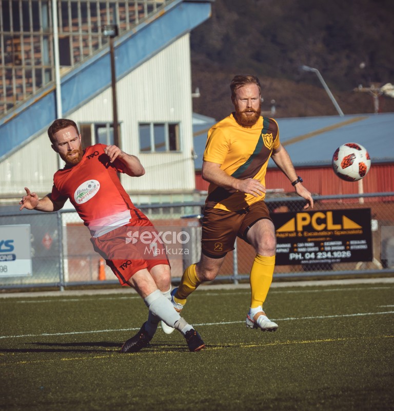 Football player push kick the ball - Sports Zone sunday league
