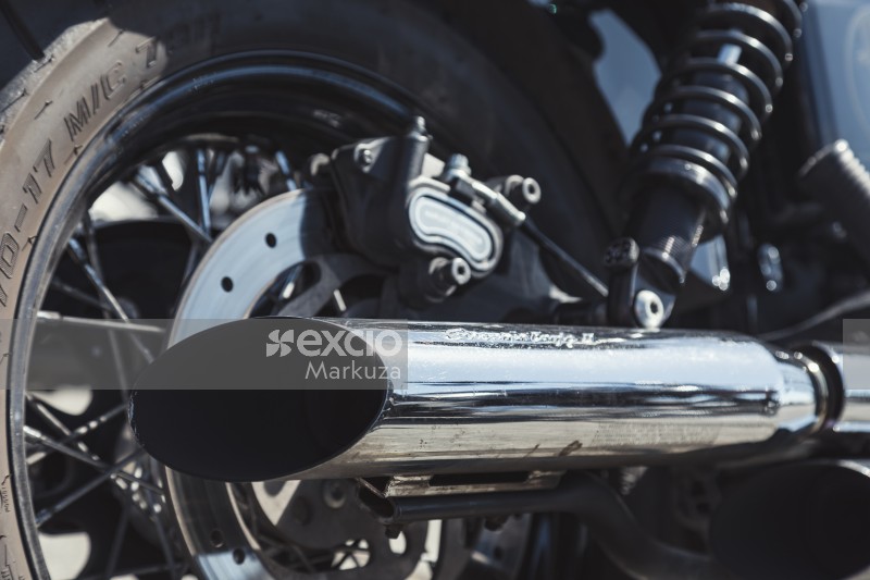 Motorbike's chrome exhaust pipe
