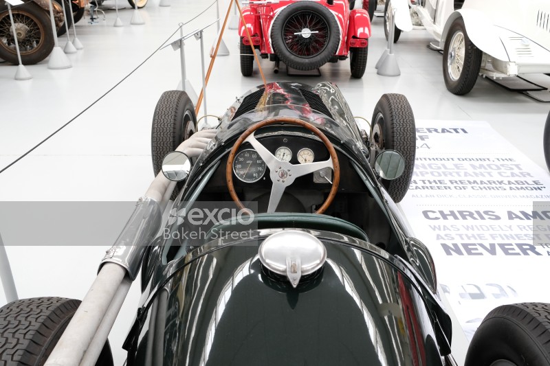 Black single seat Maserati wood steering wheel classic racing car