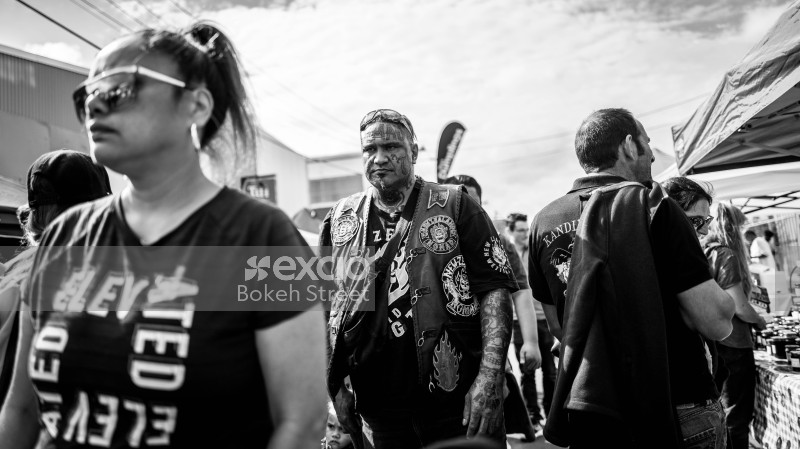 Tribal face tattooed man at Newtown festival 2021 monochrome