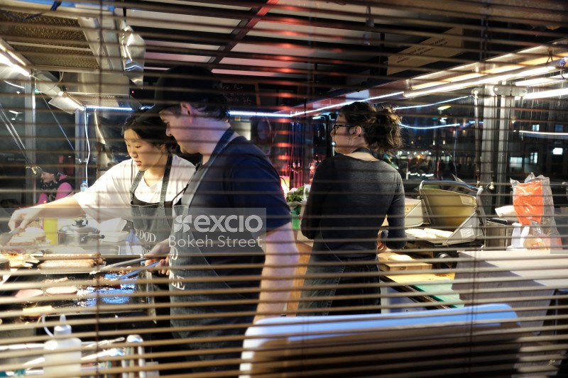 Inside view of a busy street food truck kitchen