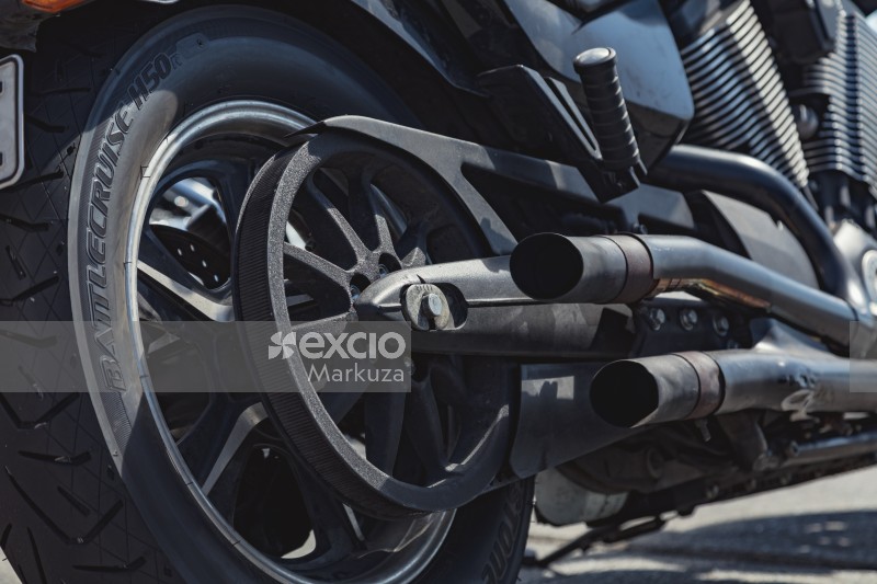 Belt driven motorbike's exhaust pipes