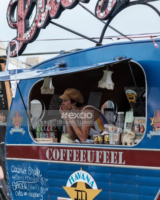 Woman in her blue food truck
