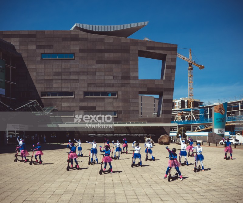 Flamingo scooter ballet in front of museum of New Zealand