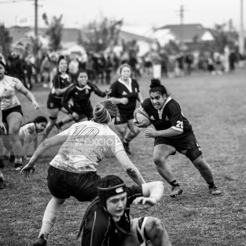 B&W women's rugby action shot