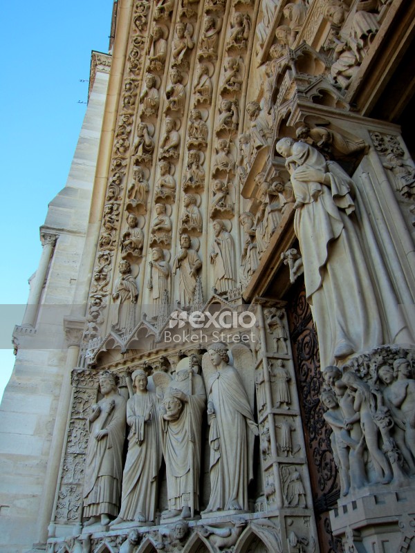 Carved sculptures at the entrance of Cathedral Notre Dame Paris